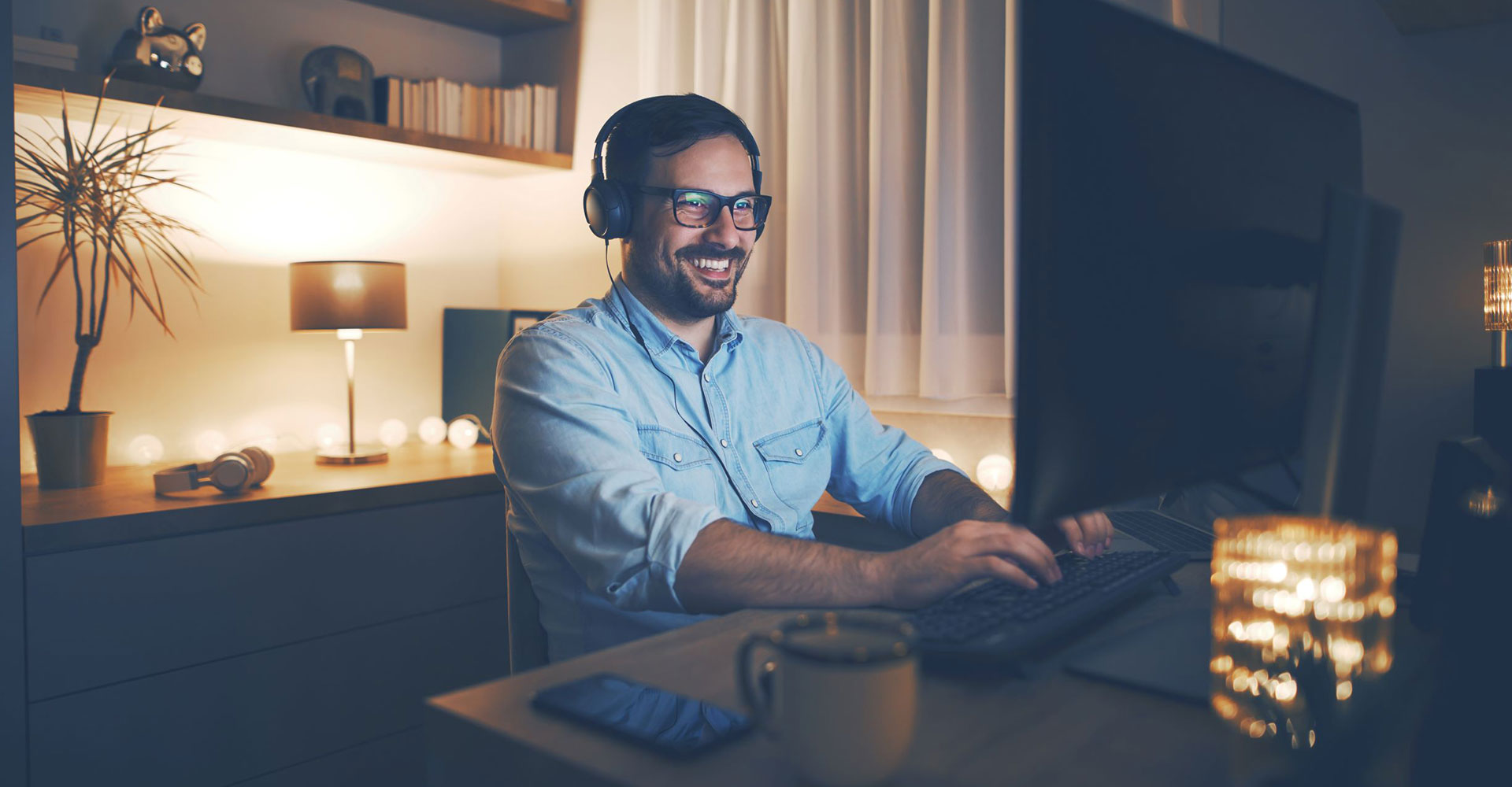 Image of a man with earphones that is creating an audio campaign